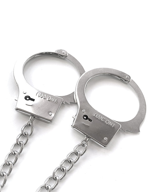 Nixie Metal Butt Plug w/Inlaid Jewel & Fur Cuff Set - Silver Metallic by Global Novelties LLC